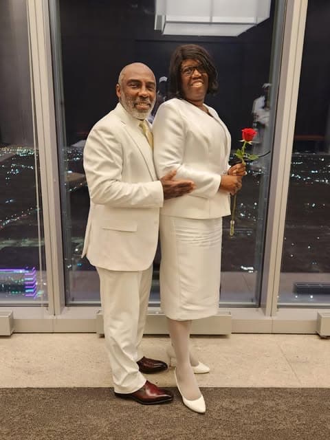 Church couple in white formal attire