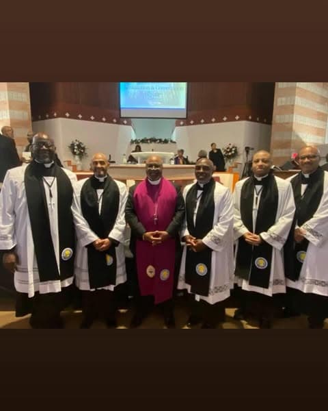 Clergy group in formal vestments